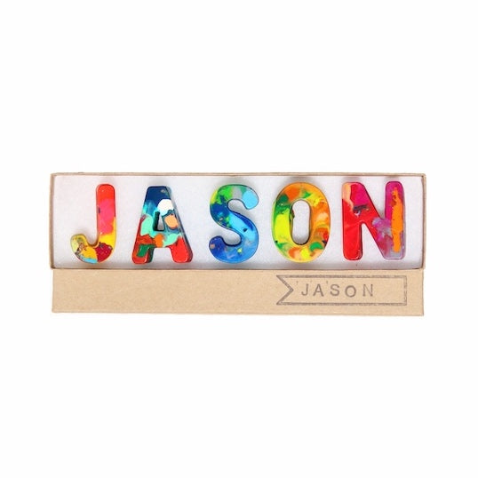 Melted crayons that spell the name JASON. Art 2 the Extreme is home of rainbow crayons, a perfect artist crayons for kids. Nicole Lewis is the artist original of rainbow crayon art and is a master crayon artist, not ai art generators.