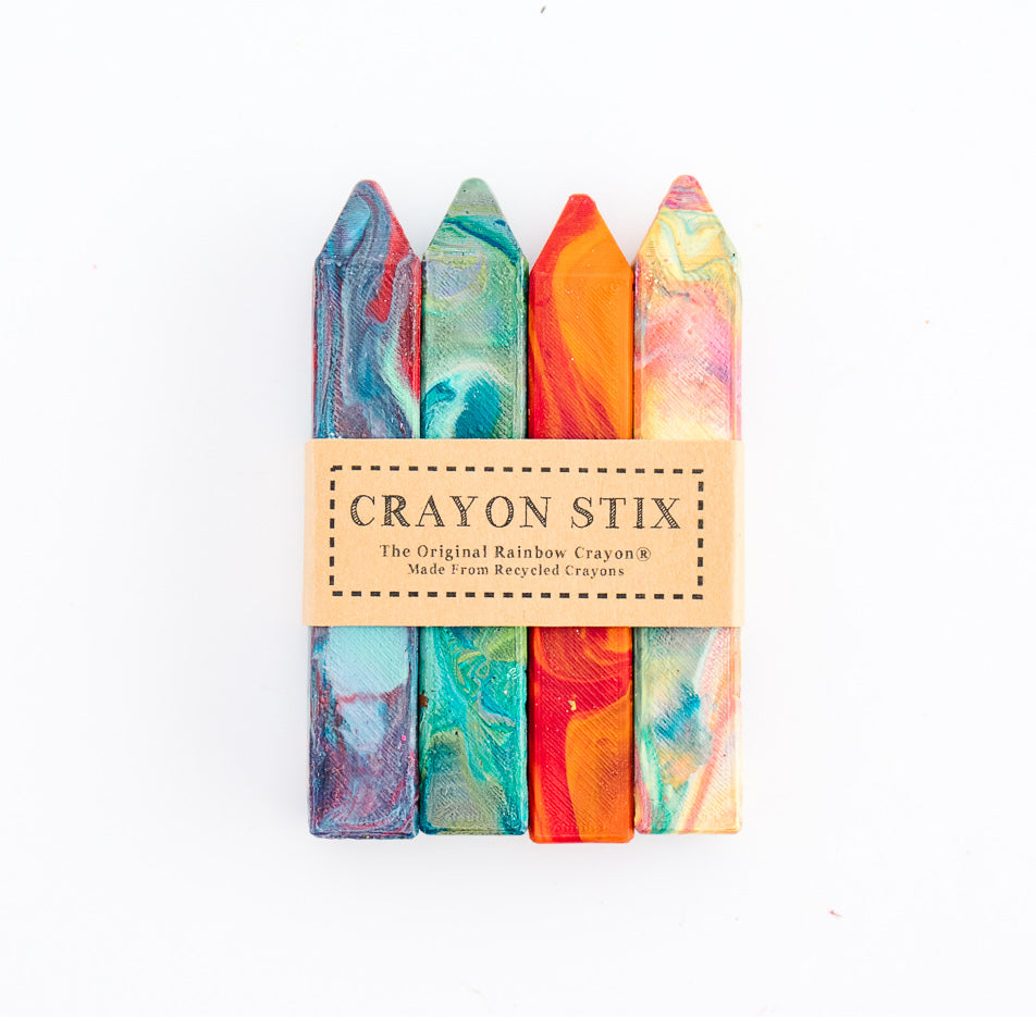 Beautiful, multicolored Crayon Stix® gifts from crayon shop, Art 2 the Extreme. This is a 4-pack of rainbow crayons that have a squared edge to them and won't roll off a table.