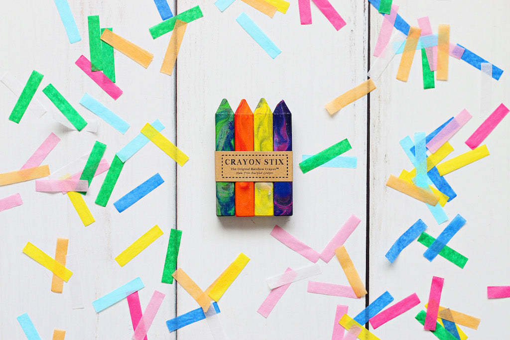 Pack of 4 multicolored crayons called Crayon Stix on a white background with confetti crayon paper. Original Rainbow Crayons, made from recycled rainbow Crayola crayons, Selling from crayon shop, Art 2 the Extreme® Crayon Gift for Kids, Arts and Craft Supplies