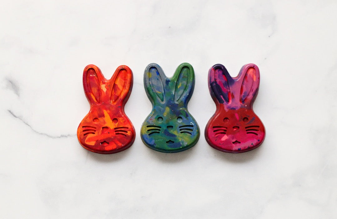 Multicolored Bunny Rainbow Crayons - This large, individual rainbow crayon is a multicolored art supply for Easter basket stuffers and a unique gift addition to your Easter crafts for kids or learning activities for kids. Bunny Rainbow Crayon Scribblers make texture rubbing art projects and educational learning activities for kids exciting as the colors mix and swirl across the page.